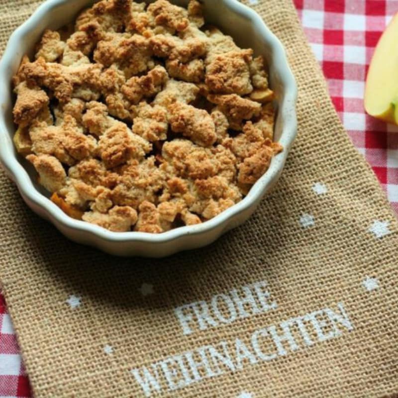 Paleo-Menü Crumble und Banderole Frohe Weihnachten