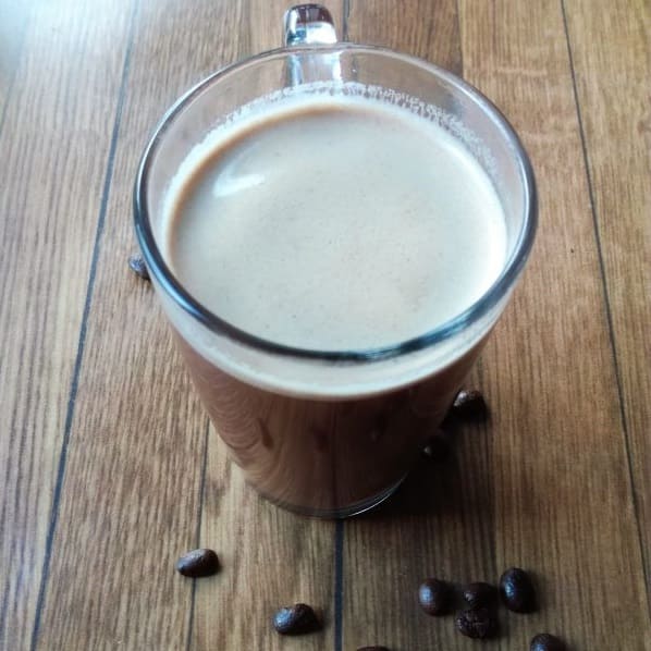 Kaffeeliebe im Glas mit Kaffeebohnen